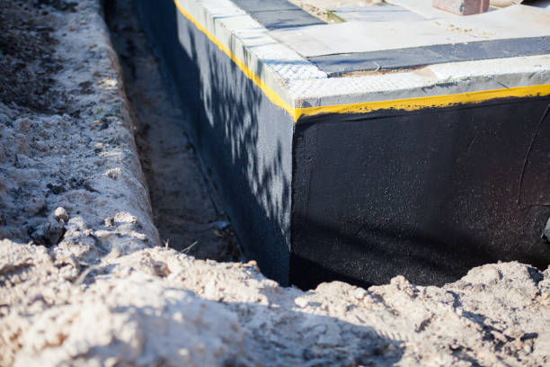 Professional Basement Waterproofing technician working in Mount Sterling, IL